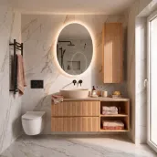 Elevate your bathroom with this 110cm wide suspended vanity in Natural Rovere wood, featuring a Belsize55 built-in basin and Travertino HPL top. The harmonious blend of premium materials and finishes adds warmth and sophistication to the space. Crafted with precision, the wood structure and matching fronts create a refined aesthetic.
