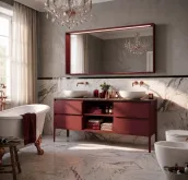 Elevate your bathroom with this sleek 180cm wide suspended vanity in a rich matte Radicchio lacquer finish. The unit features a spacious 51cm deep and 50cm high design, complete with a 1.2cm thick HPL Alabastro Grey countertop and a softly49 ceramic washbasin with two basins. The vanity is paired with a stylish wooden-framed LED-lit mirror, 160cm wide and 75cm high, with a matching matte lacquer finish.
