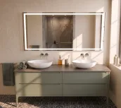 Elevate your bathroom with this 180cm wide suspended vanity in a stunning FB 47 green smoke matte finish. The unit features a spacious 51cm deep and 50cm high design, complete with a 1.2cm thick HPL Carbone Tavolato top and a softly49 ceramic double basin. The vanity comes with a rectangular LED-lit mirror, 160cm wide and 75cm high, with a 2cm thickness.