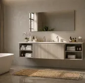 Elevate your bathroom with this sleek 240cm wide suspended vanity in a sophisticated RAL 7047 matte lacquer finish. The unit features a spacious 46cm deep and 50cm high design with a free-standing layout, complete with a built-in Tekhnos RAL 7047 1.2cm thick top and a double cubik B343 sink. The vanity comes with a B Cannettato handle and a rectangular mirror, 175cm wide and 75cm high, with a 2cm thickness.