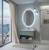 Elevate your bathroom with this bespoke, wall-mounted cabinet in a soothing stone blue matte lacquer finish, perfectly complemented by a crisp white Tecnoril top and built-in CUBIK B343_1 sink. Measuring 90 cm in width, 46 cm in depth, and 50 cm in height.