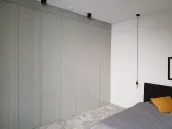 Fitted wardrobe: personalized in color and dimensions, and designed by our client for their bedroom to create harmony with great style - Frankfurt, Germany - RAL7038 matte lacquered with integrated handles. 

The exact measurements of the niche 395,4 cm in width, 279 cm in height (wardrobe height 265 cm), and 61 cm in depth.
