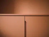 Sideboard: a practical and compact piece of furniture for the entrance, hallway, or even the dining room next to the kitchen, perfect for storing dishes, glasses, or table linens. It is also ideal for an office to keep documents or coffee-making equipment organized.

This sideboard was crafted for our customer&rsquo;s home in in Breuberg, Germany - FB 64 Red Earth lacquered mate with integrated handles.

The exact measurements of this sideboard are 389,5 cm in width, 90 cm in height, and 61 cm in depth.